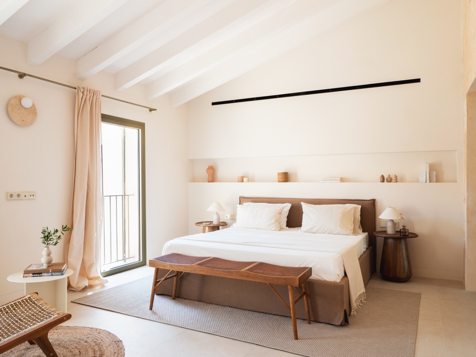 Master bedroom with lime-washed walls